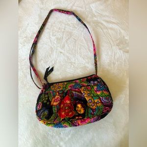 Zip closure.
9.0" w x 6.25" h x 2.5" d,  7.0" strap drop, 56.0" , adjustable